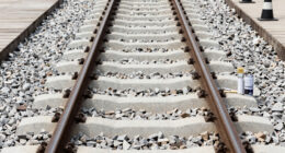 Painting The Sides Of Railroad Rails White To Reduce Derailment