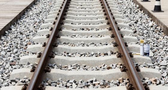 Painting The Sides Of Railroad Rails White To Reduce Derailment
